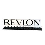 Revlon logoskilt
